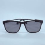 Lacoste 23018 sunglasses in Black and Red – front open view