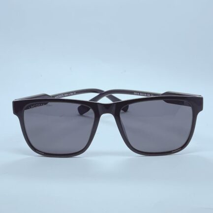 Lacoste 23018 sunglasses in Black and Red โ front open view