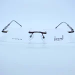 Dune Well rimless 010 Eyeglasses in Black – front open view