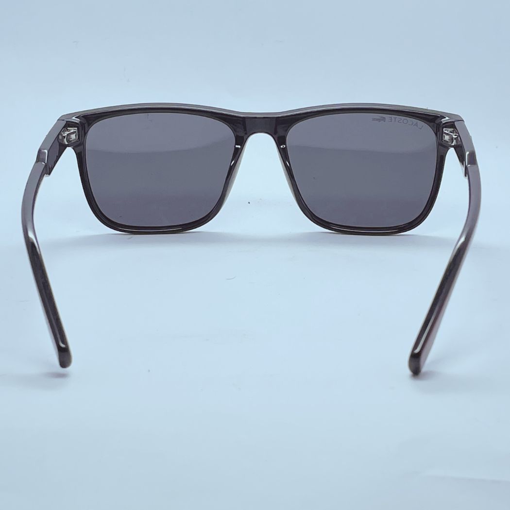 Lacoste 23018 sunglasses in Black and Red โ back view