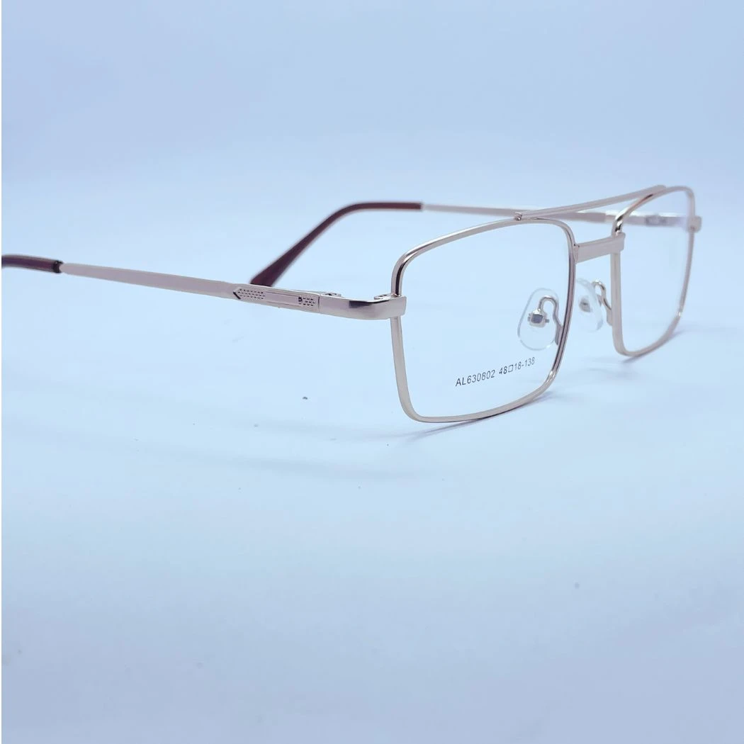 Vision 630802 Eyeglasses – Angled Side View (Golden) Vision 630802 eyeglasses in Golden – angled side view