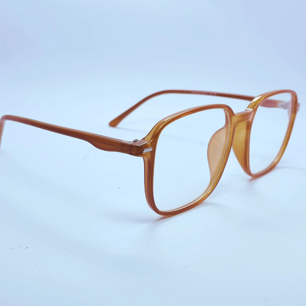 Vision 60144 Eyeglasses – Angled Side View (Brown) Vision 60144 Eyeglasses in Brown – angled side view