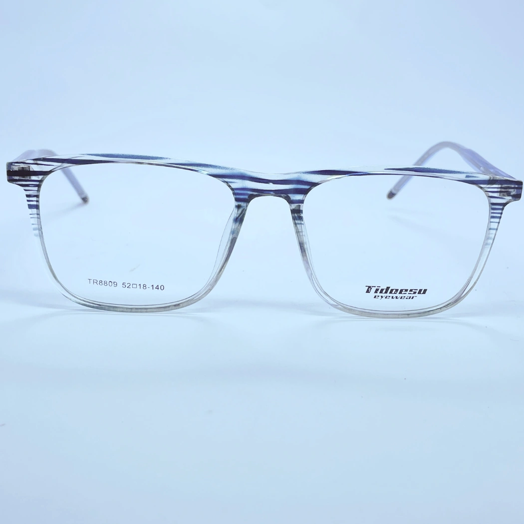 Tidoesu 8809 Eyeglasses – Front Open View (transparent blue) Tidoesu 8809 Eyeglasses in transparent blue – front open view