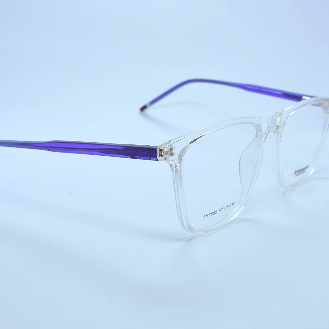 Tidoesu 8809 Eyeglasses – Angled Side View (transparent blue) Tidoesu 8809 Eyeglasses in transparent blue – angled side view