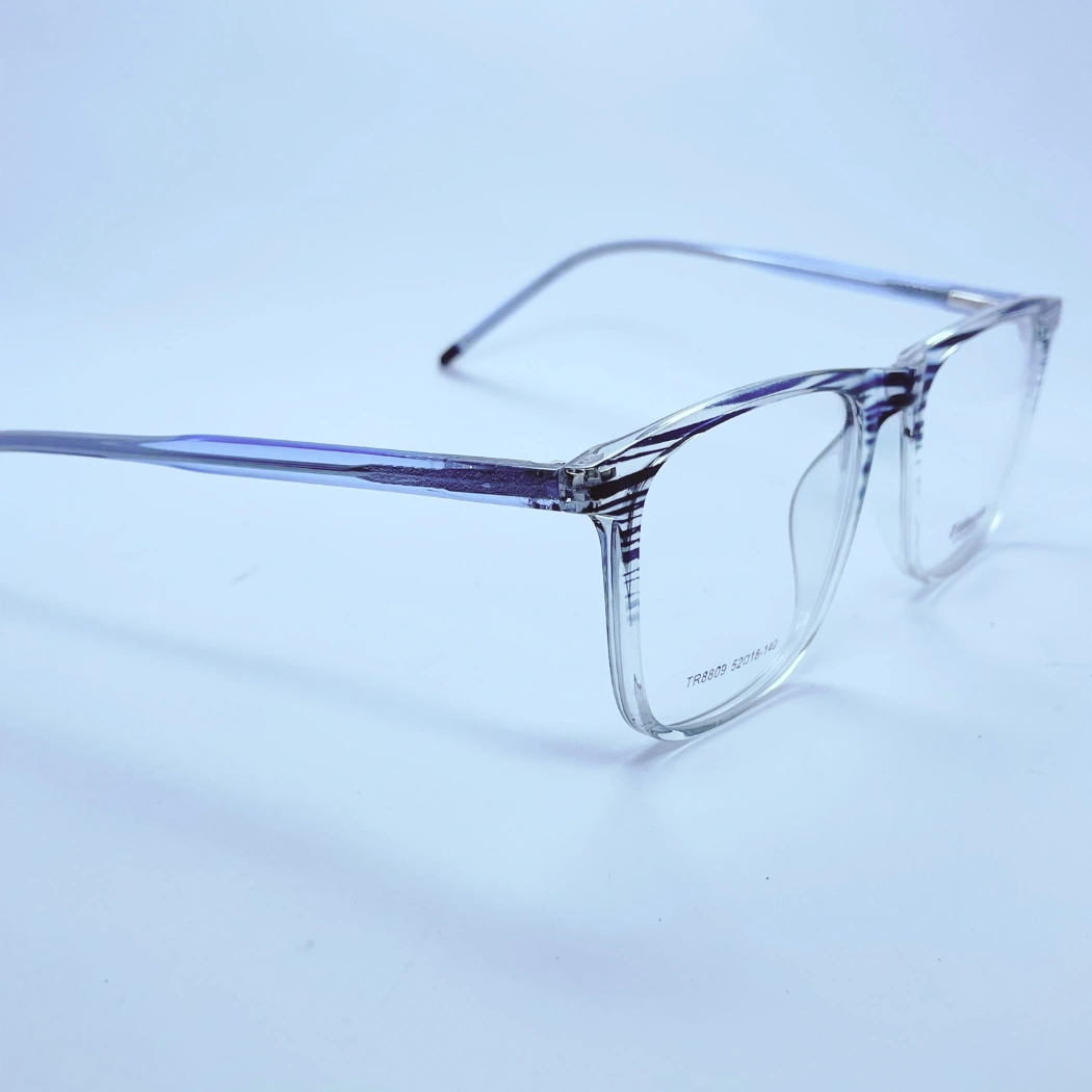 Tidoesu 8809 Eyeglasses – Angled Side View (transparent blue) Tidoesu 8809 Eyeglasses in transparent blue – angled side view