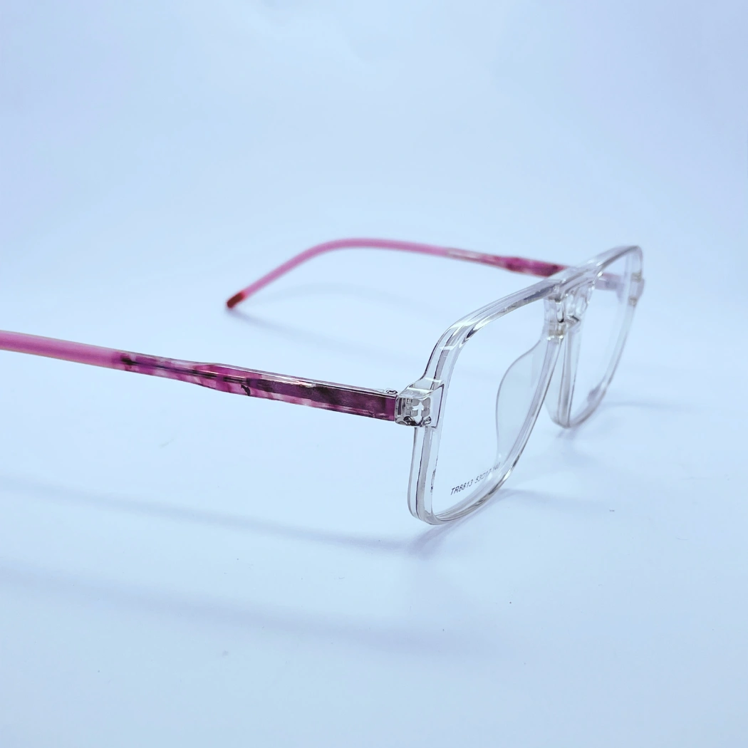 Tidoesu 8813 Eyeglasses – Angled Side View (Transparent and pink) Tidoesu 8813 Eyeglasses in Transparent and pink – angled side view